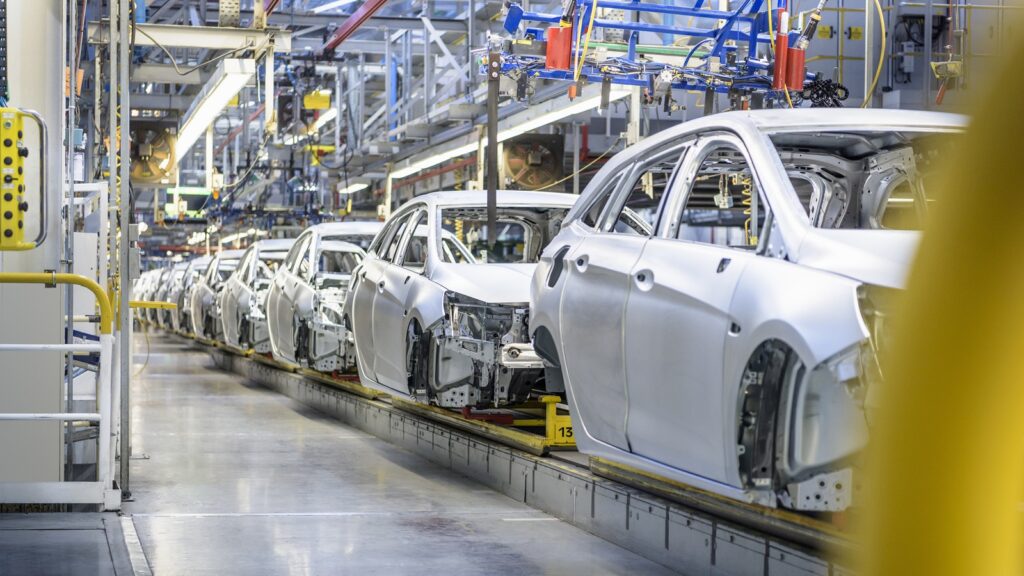 View of cars on production line in factory