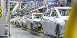 View of cars on production line in factory