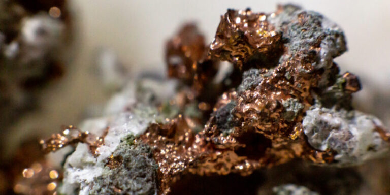 Native,Copper,Inserted,In,A,Rock